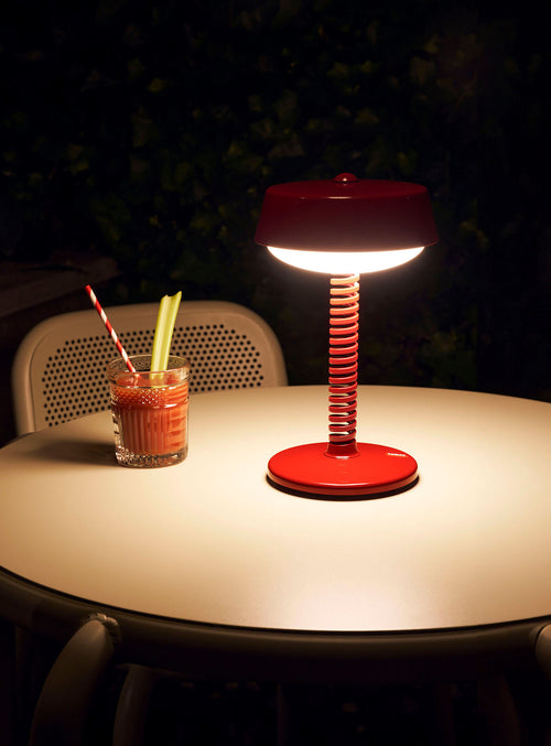 Fatboy Bellboy cordless table lamp, dimmable and portable, perfect for indoor or outdoor use, offering up to 90 hours of LED light autonomy.