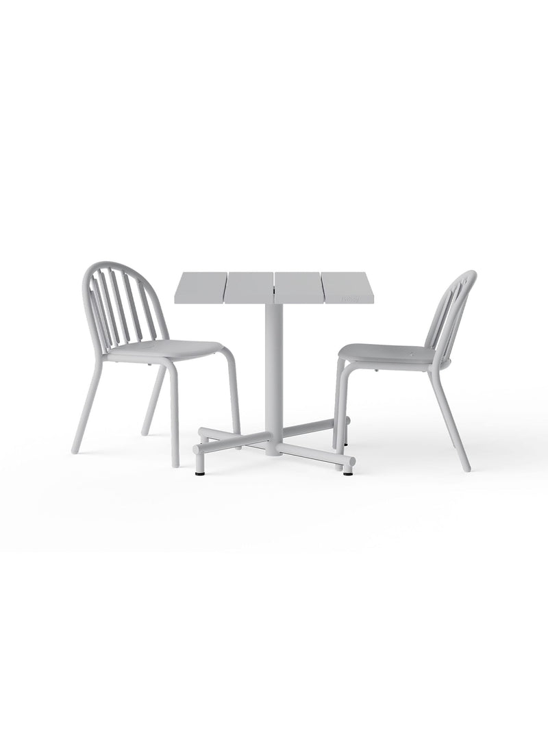 Fred’s Square Bistro Set in Light Grey pairs an 80×80 cm table with two stackable chairs for stylish outdoor dining.