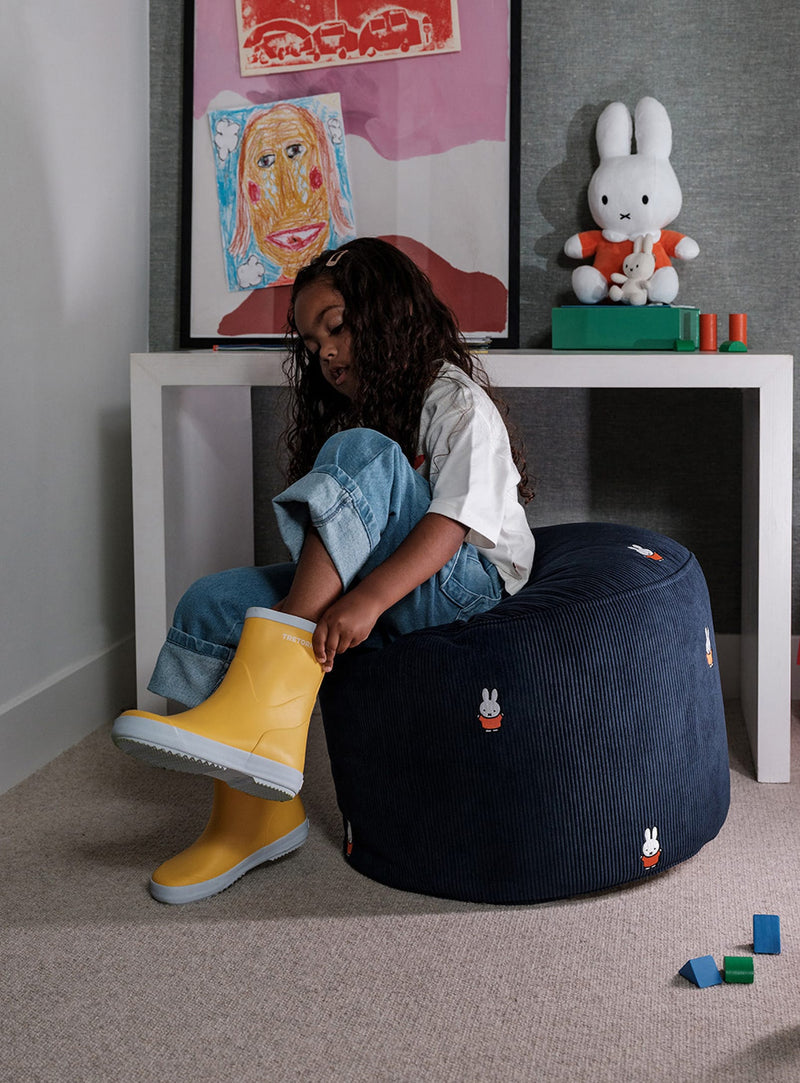 Cozy and playful Fatboy Point Cord x Miffy pouf, perfect as a seat, footrest, or side table in any interior.