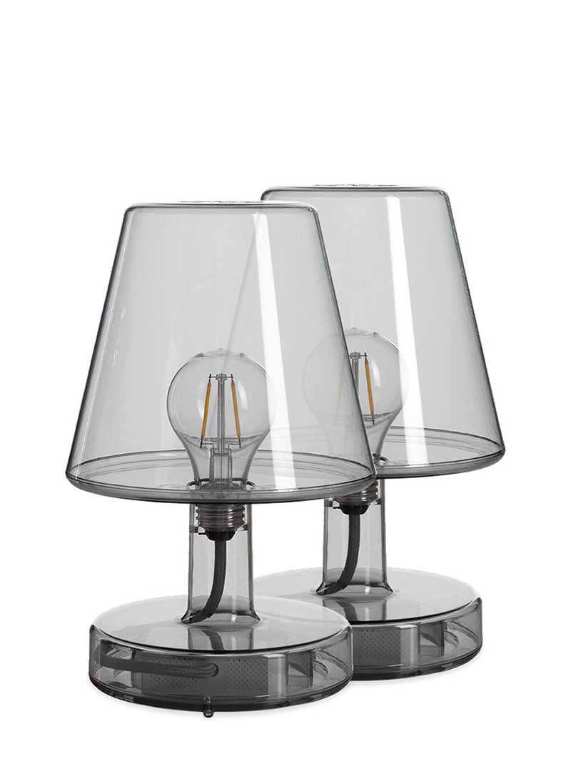 Set of 2 Fatboy Transloetje table lamps in transparent grey color, featuring wireless, touch-controlled LED lighting with 3 brightness settings for modern Canadian interiors.