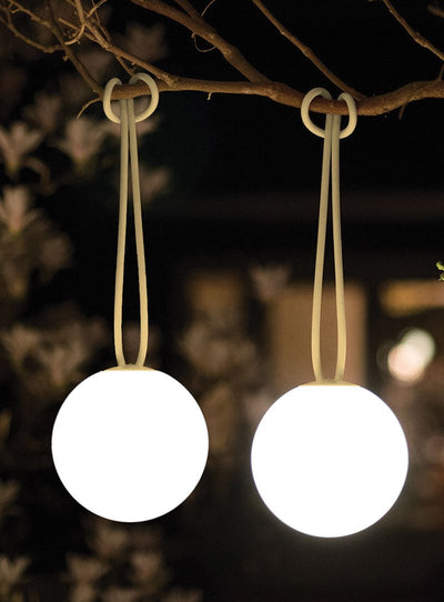 Create a magical atmosphere with our set of two Bolleke lamps. These spherical lights are perfect for outdoor events and gatherings, and can be hung anywhere without the need for a power source. With three different brightness levels, Bolleke lamps are the ultimate mood makers.
