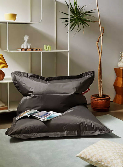 Discover the innovative design of the Slim Bean Bag, a contemporary take on the Original beanbag created by Finnish designer Jukka Setälä. With its sleek and slim profile, this updated version is perfect for modern interiors and small spaces. Its high-quality filling ensures ultimate comfort and support, while its stylish design complements any decor.