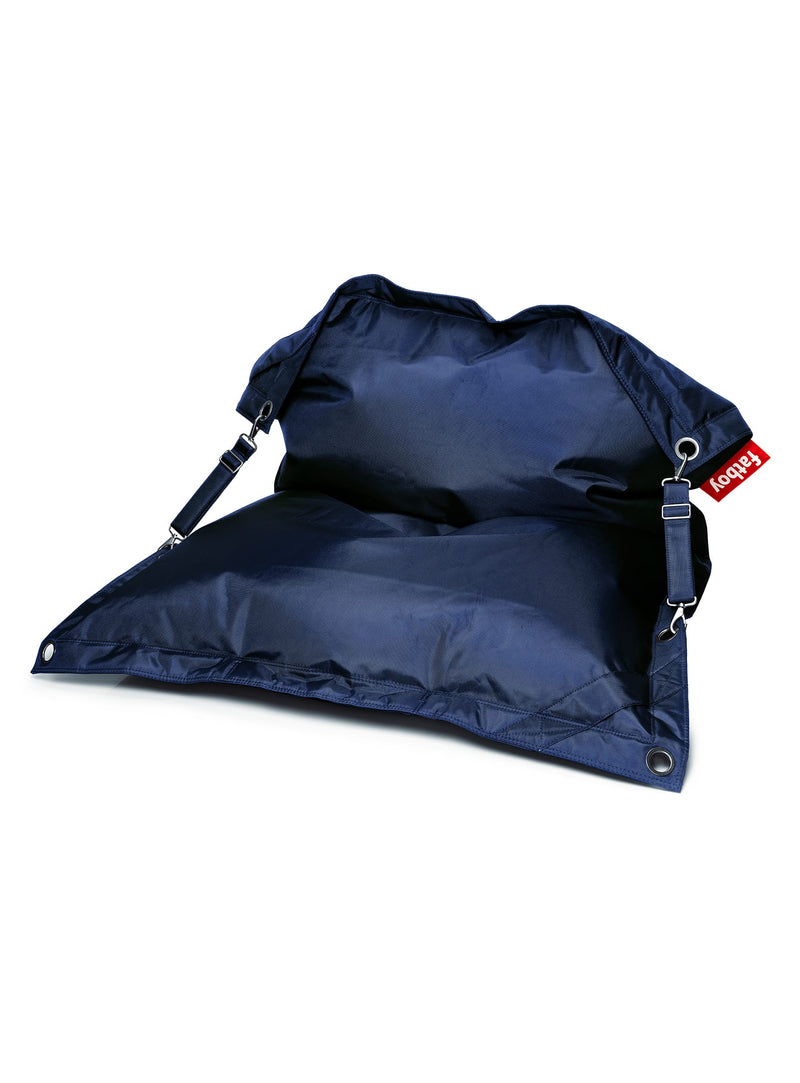 Fatboy Buggle-Up dark blue bean bag chair, versatile and water-repellent, with adjustable straps for solo or duo seating, ideal for indoor use.