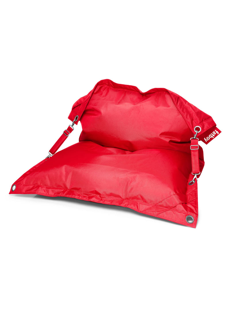 Fatboy Buggle-Up red bean bag chair, versatile and water-repellent, with adjustable straps for solo or duo seating, ideal for indoor use.