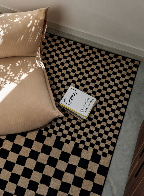 Graphic indoor rug with a bold navy and beige block pattern, soft underfoot and made for everyday living.