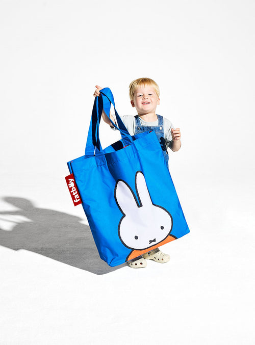 Bright and cheerful Fatboy Carry-All-Bag x Miffy used for beach days, groceries, or weekend adventures.
