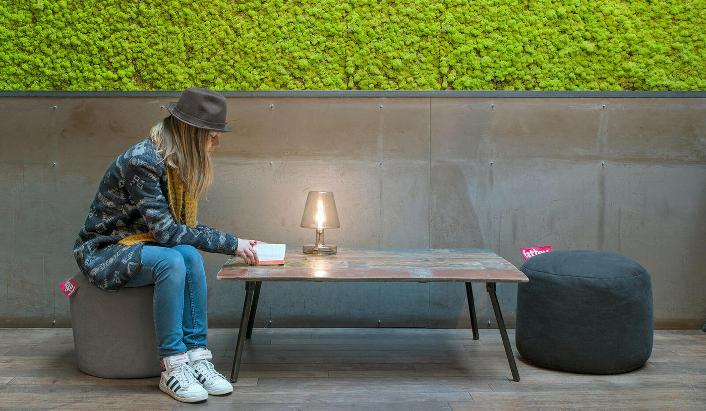 Fatboy Point Stonewashed: Multifunctional cotton pouf, perfect as a seat, side table, or footrest, blending softness with sturdy design.