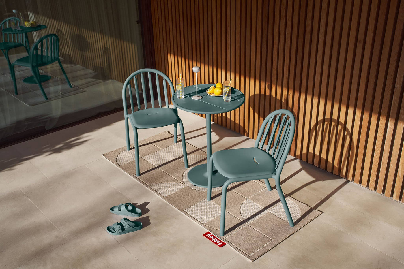 Elegant and durable Fred's Chair and Armchair by Fatboy - outdoor seating designed for lasting comfort and easy stacking.