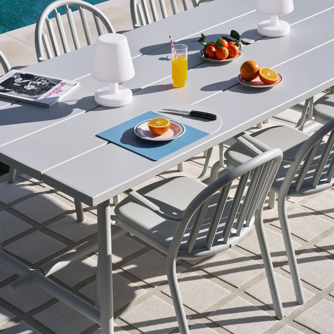 Fred's Table and Fred's Bistreau outdoor tables, stylish and durable for any setting; Fred's Table seats six with a picnic-inspired design, perfect for gatherings, while Fred's Bistreau adds French bistro charm to balconies and terraces, creating a cozy, inviting space.