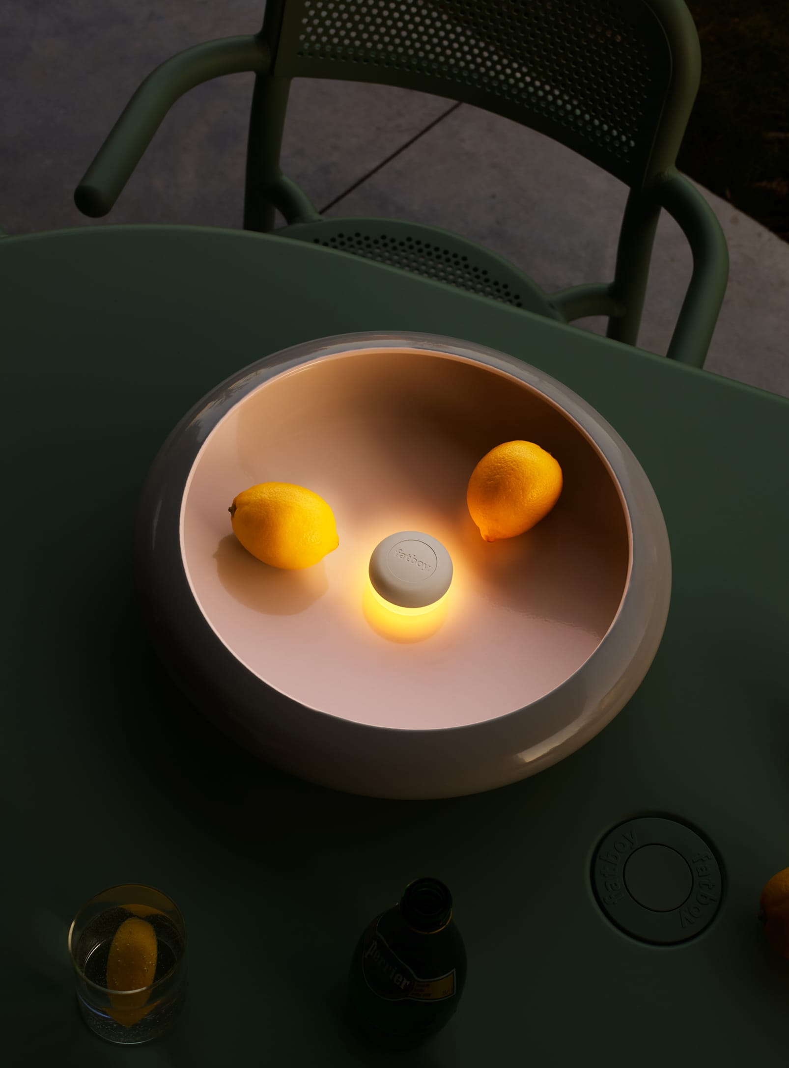 Fatboy Oloha, a versatile wall and table lamp with a warm LED light and magnetic design, perfect for Canadian homes and creative spaces.