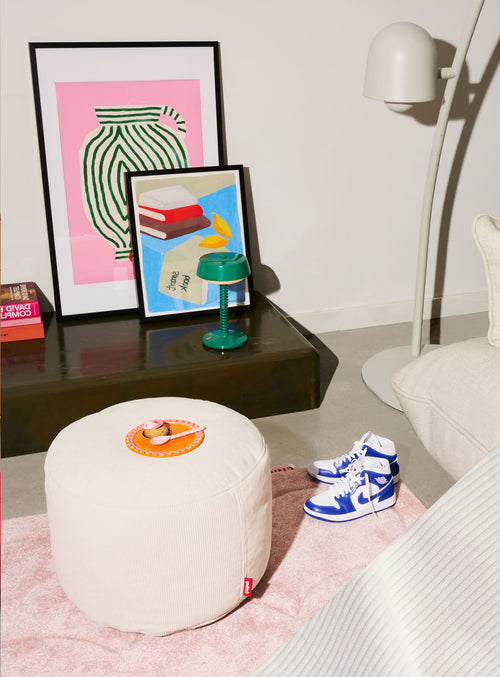 Fatboy Point Cord is a chic, eco-friendly ottoman crafted from recycled materials. Its soft, ribbed velour cover adds texture and warmth, making it ideal for modern Canadian interiors.
