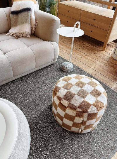 Add warmth and texture to any room with the Point Teddy Chess, a plush checkered pouf featuring soft teddy fabric and a stable, non-slip base.