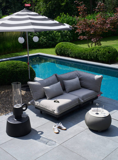 The Fatboy Paletti 2-piece outdoor sofa is UV-resistant and water-repellent, offering versatile comfort for outdoor lounging on patios and in gardens across Canada.