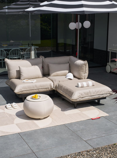 The Fatboy Paletti Sectional 3-Seater is a modular, water-resistant outdoor sofa designed for relaxing on patios and in gardens across Canada.