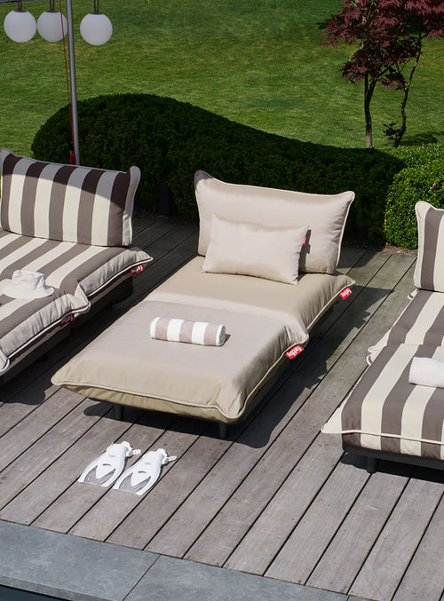 The Fatboy Paletti Lounger is an outdoor daybed with water-repellent fabric, ideal for relaxing on patios and in gardens throughout Canada.