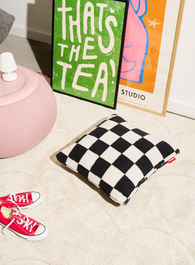 The Square Pillow Teddy Chess adds bold pattern and plush comfort to any sofa, bed, or armchair.