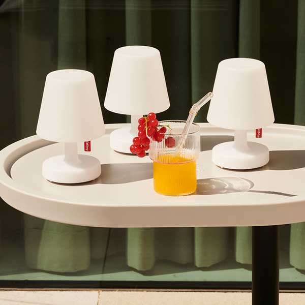 This set of three mini, portable table lamps can be used all around the house. Put one here, there, or all three together. Their soft, subtle lighting gives them a candle-y feel, but with a lampshade style.