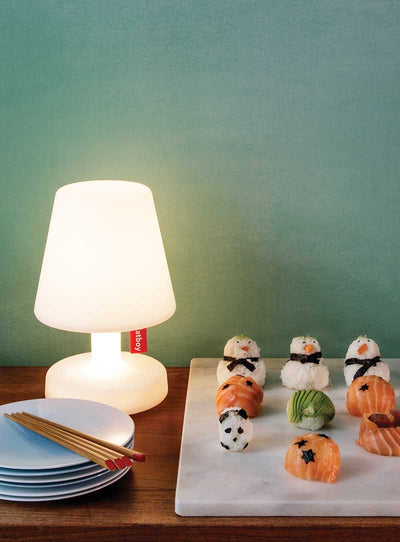 Small. Modest. Iconic. The Fatboy Edison the Petit portable and rechargeable table lamp shines with its versatility.