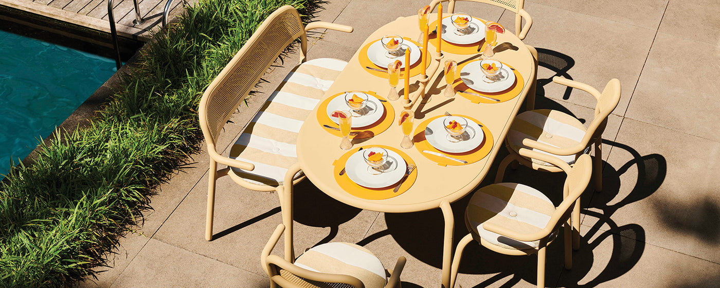 The Toní collection, designed by Erik Stehmann, is round and colorful. They are reminiscent of bistro furniture which gives them a familiar feel.