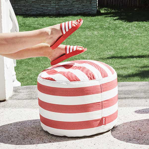 Pretty and practical, this small round outdoor pouf is the dot on the i for everyone's outdoor spaces.