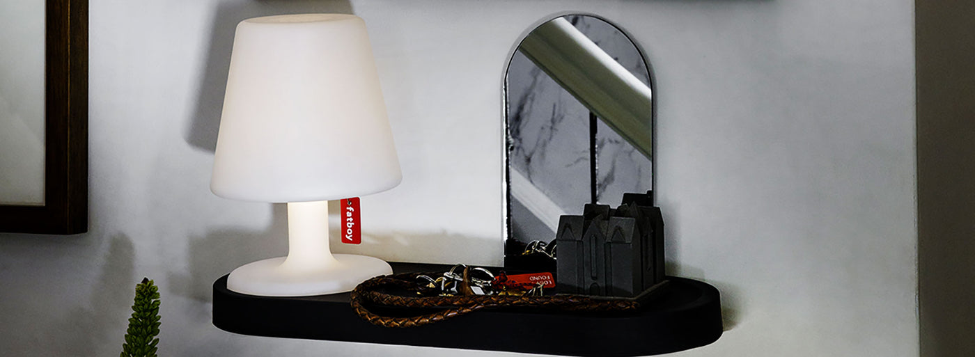 A stylish base for the lamp as a spacious tray that holds keys, cherished trinkets and cart parts that are always missing when you need them.