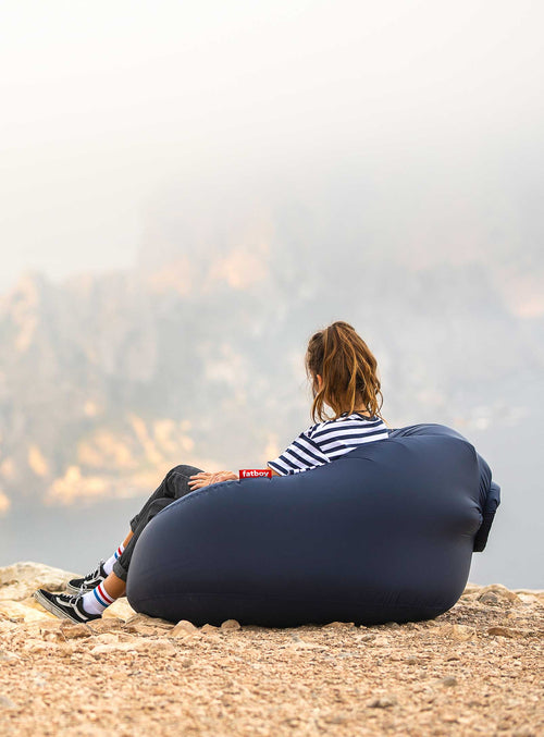 Relax in style with the Fatboy Lamzac inflatable lounge chair. Compact and portable, it's perfect for outdoor adventures and can be quickly inflated for maximum comfort.