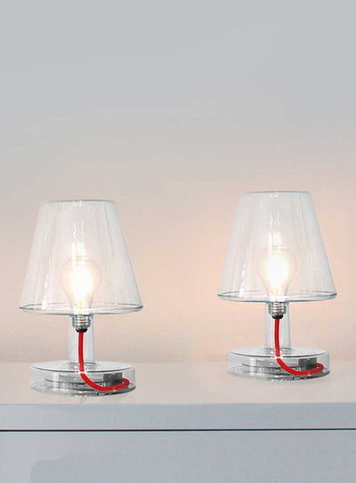 Add a vintage touch to your home with our set of two Fatboy Transloetje lamps. With their energy-efficient LED technology and rechargeable batteries, these retro lamps are both functional and stylish.
